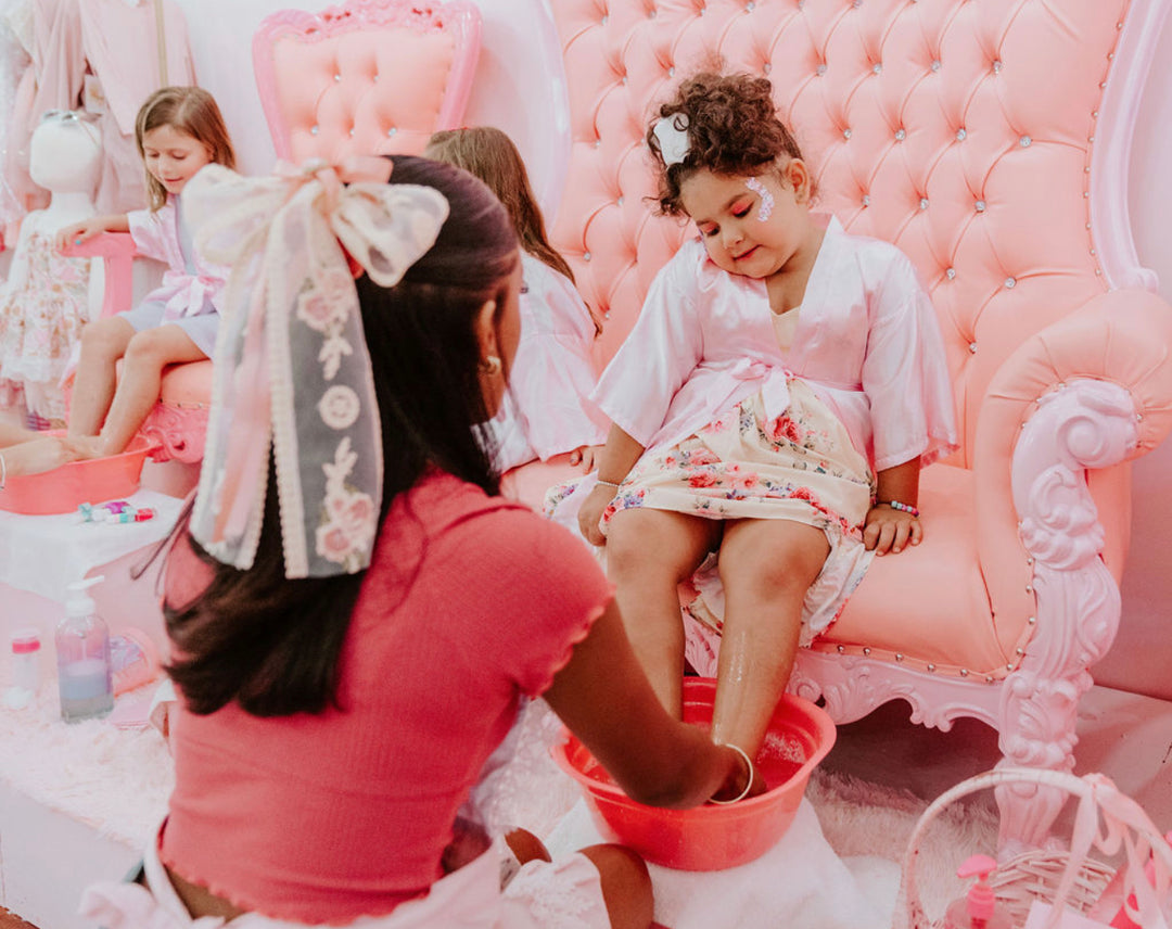 Little girl receiving a pedicure