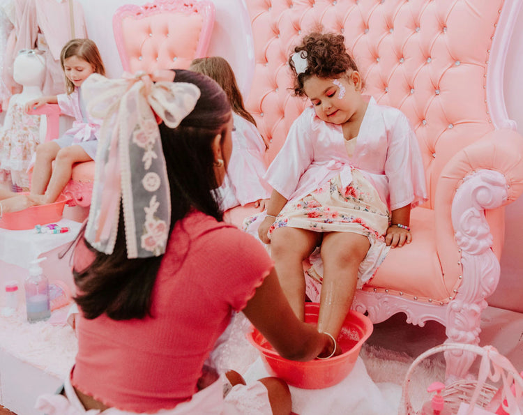 Little girl receiving a pedicure